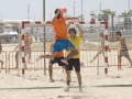 Handball player jumping with the ball