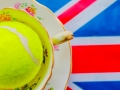 British Tennis - A cup and saucer with a tennis ball inside on top of the union jack flag